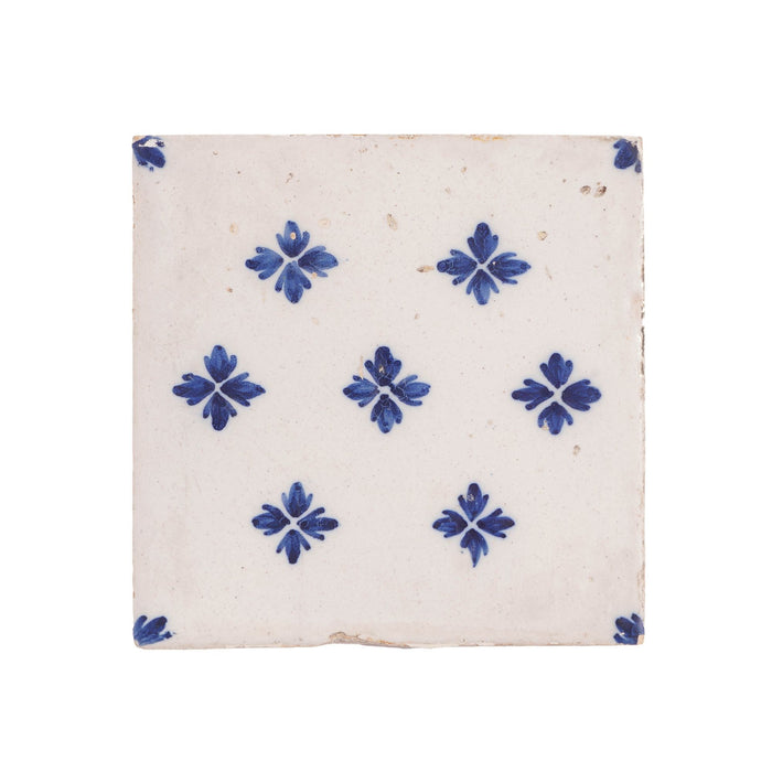 Set of 9 Delft tiles in cobalt pattern of florets (c. 1600’s)