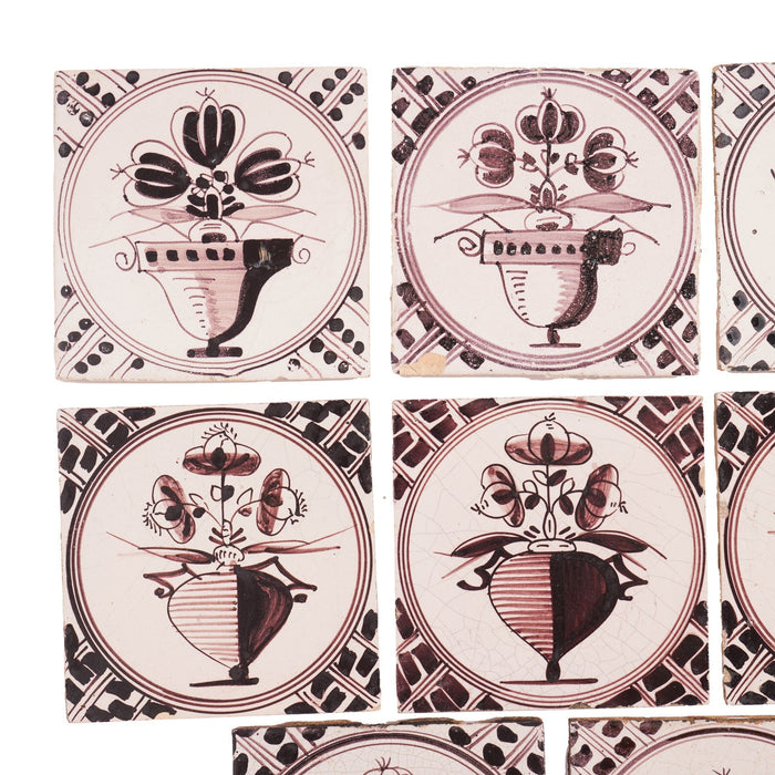 Set of 18 mulberry decorated Delft tiles (1700's)