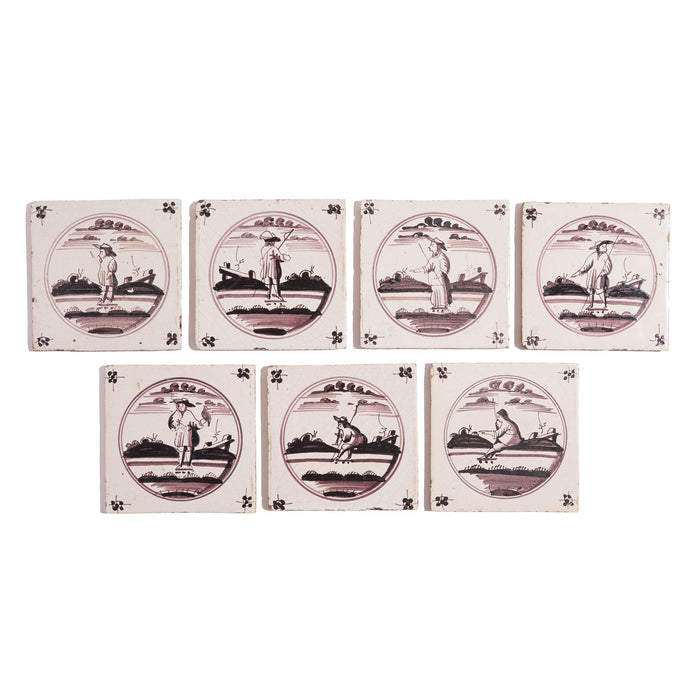 Set of 7 mulberry decorated figural Delft faience tiles (c. 1680-1700)