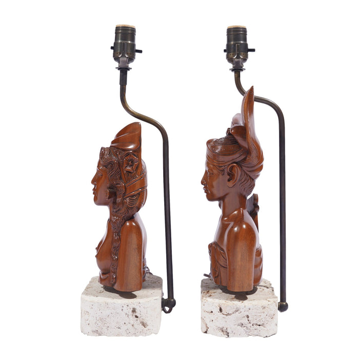 Pair of Balinese carved bust lamps mounted on cut coral bases (c. 1920-40)