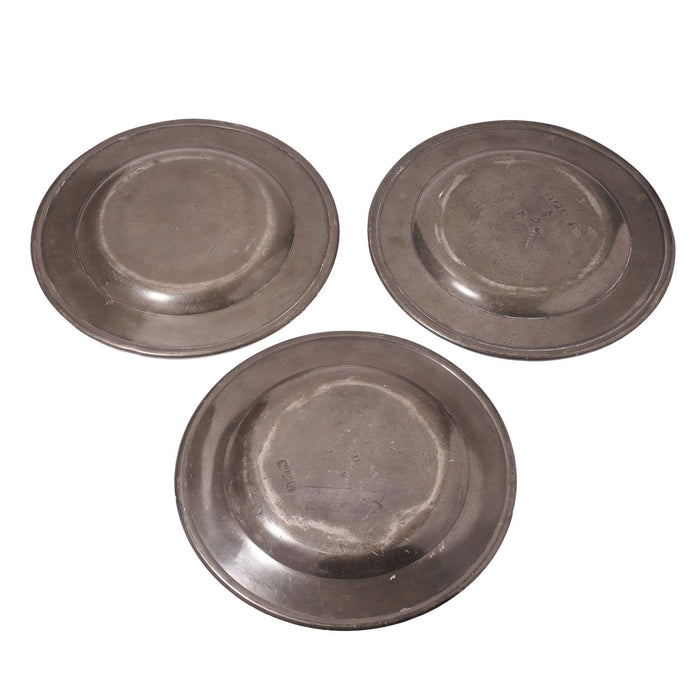 Set of three flat rim pewter plates (c. 1775-1800)