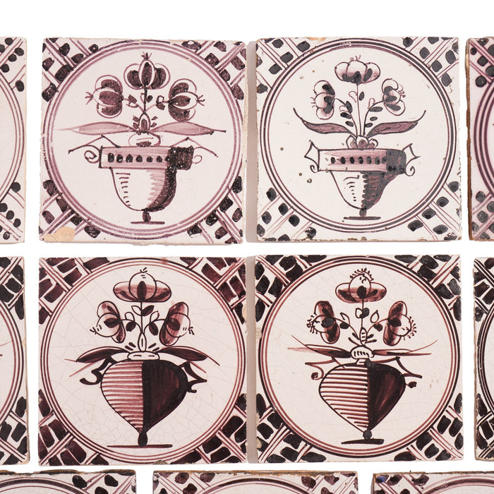 Set of 18 mulberry decorated Delft tiles (1700's)