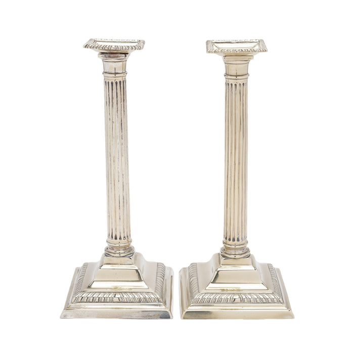 Pair of English Paktong cast columnar candlesticks (c. 1780)