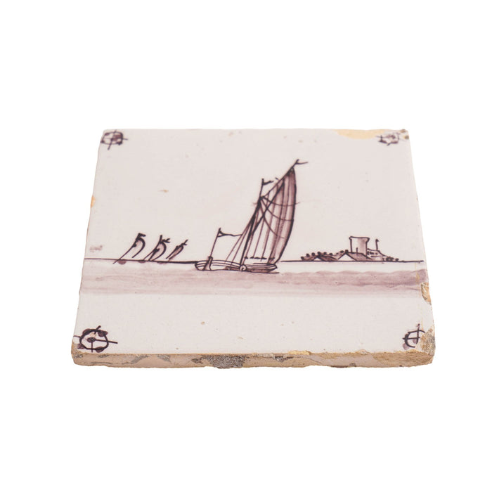 Pair of mulberry faience tiles of sailing vessels (c. 1700's)