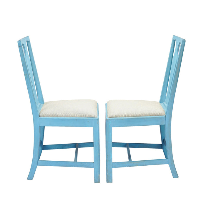 Pair of painted Academic Revival slip seat side chairs (c. 1940)