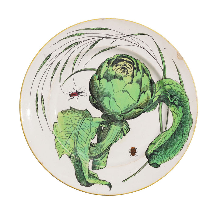 Pair of French glazed faience plates with scallions and artichokes (c. 1850's)