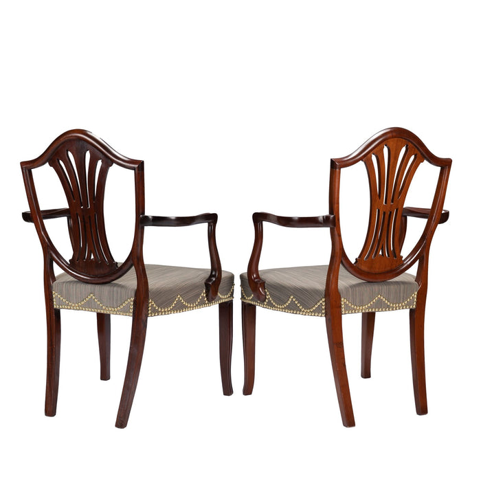 Pair of English Sheraton mahogany shield back armchairs (c. 1790)