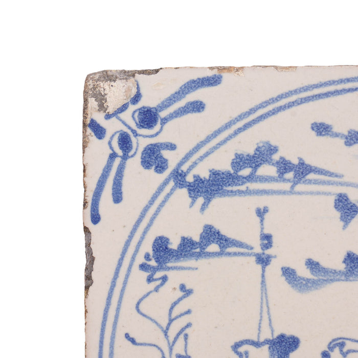 Deft scenic tile of girl astride a farm animal (c. 1600's)