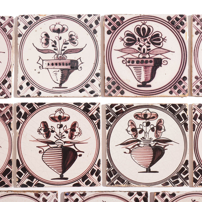 Set of 18 mulberry decorated Delft tiles (1700's)