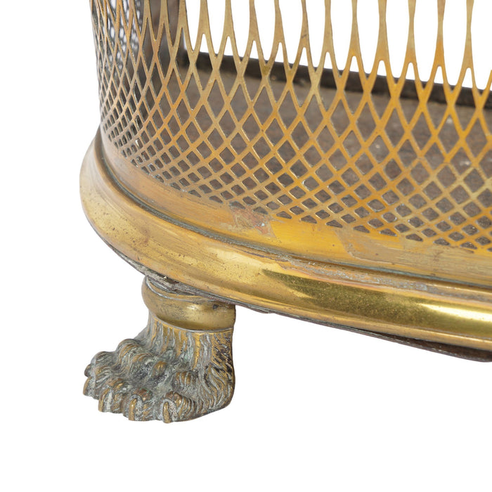 English reticulated brass fire fender with lion's paw feet (c. 1810)
