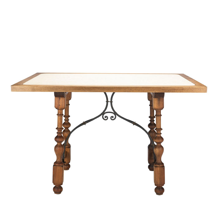 Walnut and travertine marble top table in the Spanish Baroque taste (1925)