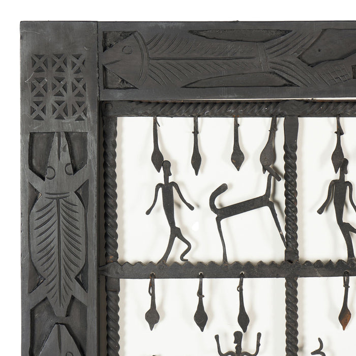 Dogon tribal hand forged rope twist iron window pane grill with figures (1900-25)