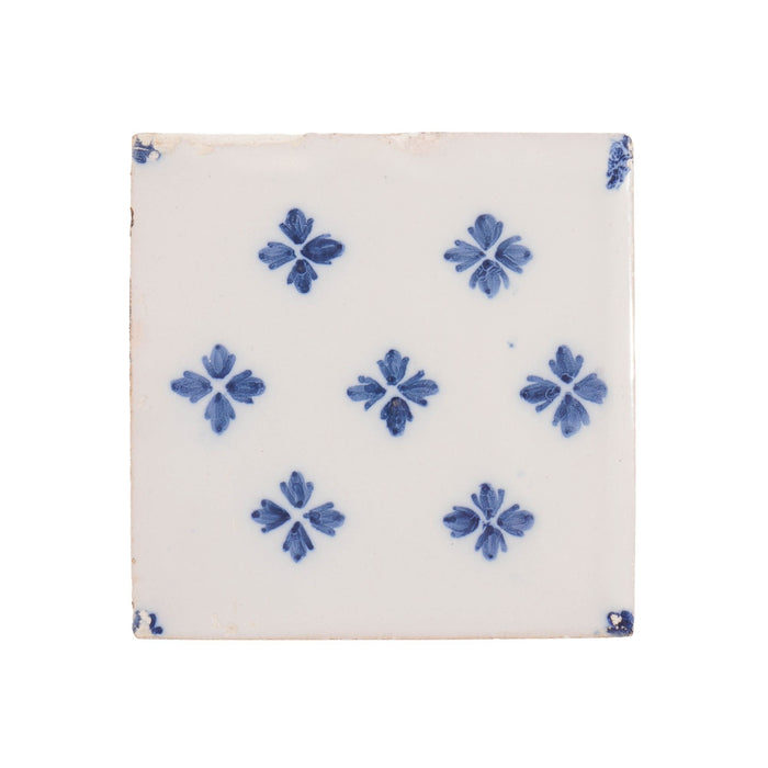 Set of 9 Delft tiles in cobalt pattern of florets (c. 1600’s)
