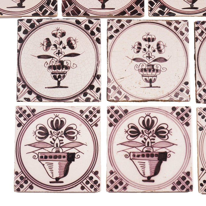 Set of 18 mulberry decorated Delft tiles (1700's)