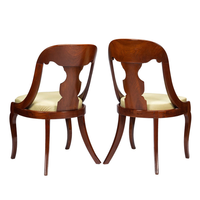 Pair of American mahogany gondola chairs (c. 1815-35)