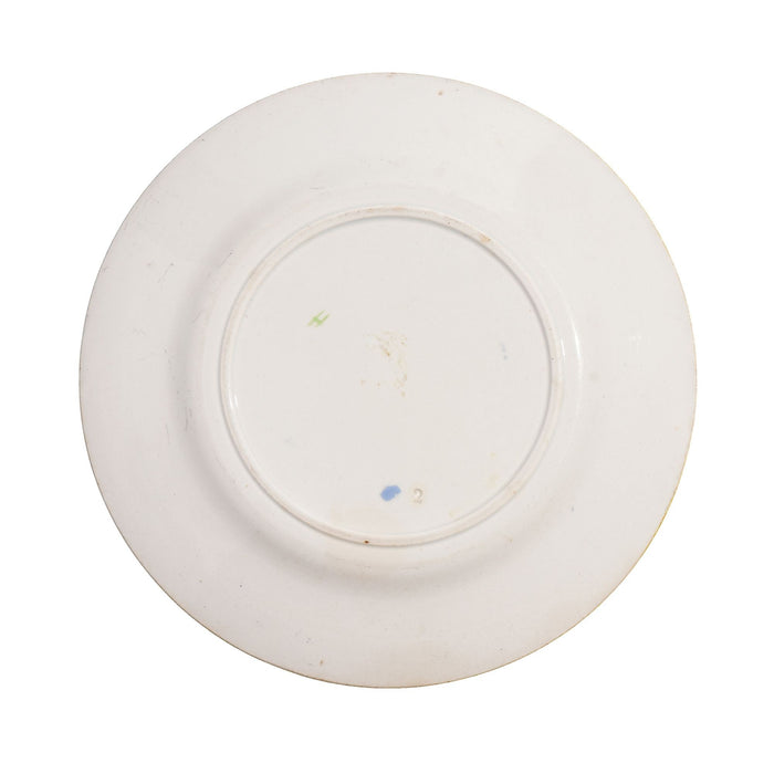 Pair of French glazed faience plates with scallions and artichokes (c. 1850's)