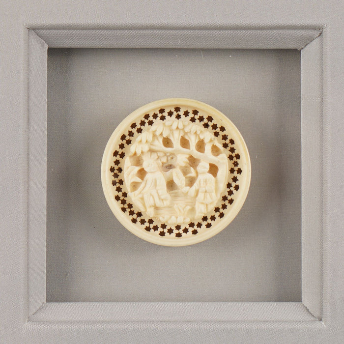 Pair of framed Chinese carved bone game pieces (c. 1820)