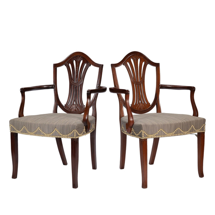 Pair of English Sheraton mahogany shield back armchairs (c. 1790)