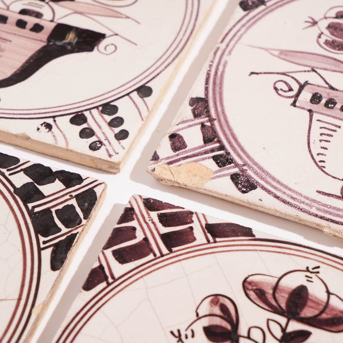 Set of 18 mulberry decorated Delft tiles (1700's)
