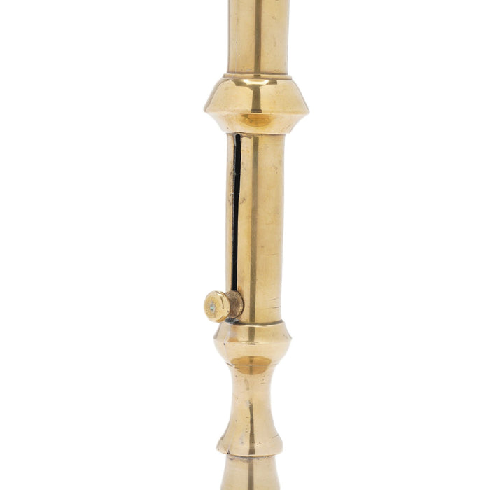 English Georgian cast brass cannon barrel candlestick (c. 1740)