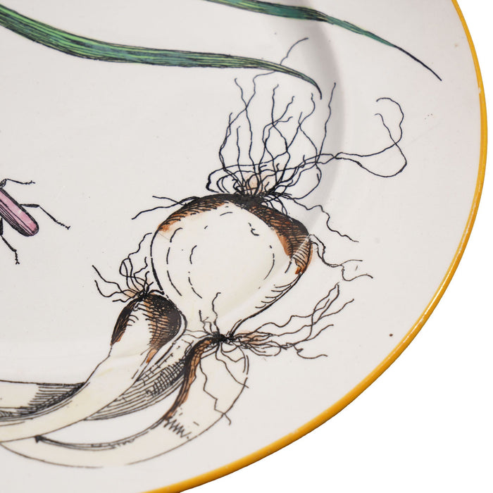 Pair of French glazed faience plates with scallions and artichokes (c. 1850's)