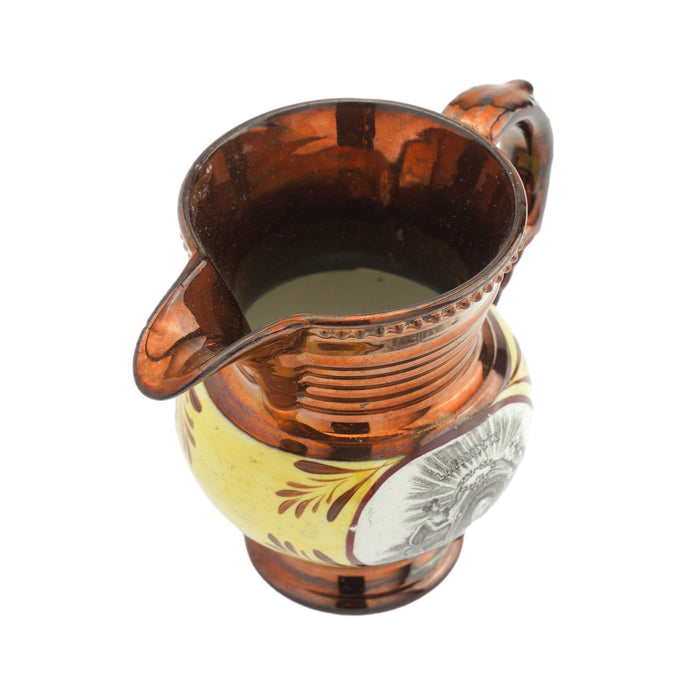 Historic Staffordshire copper luster milk jug (c. 1825)