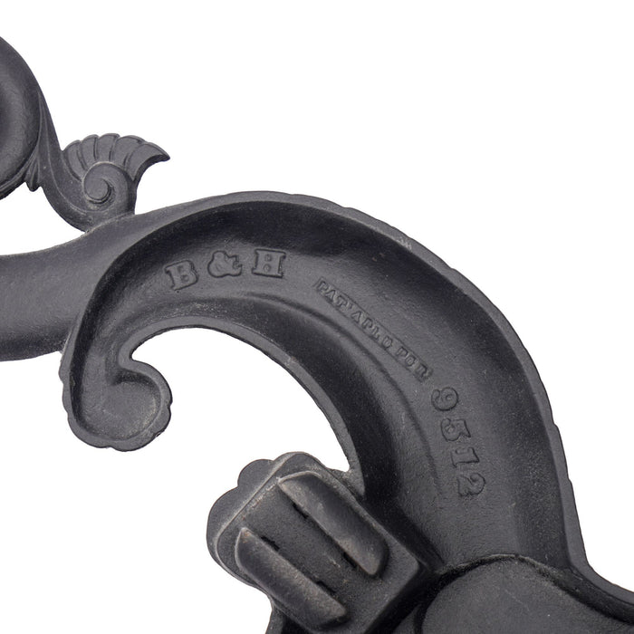 Pair of cast iron dolphin form andirons by Bradley & Hubbard (c. 1900)