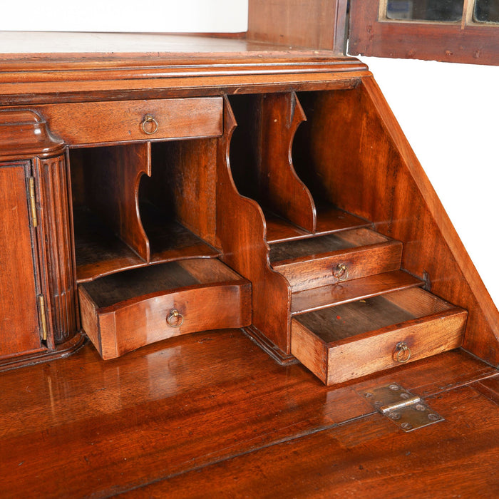 English George III Chippendale slant front secretary desk with glazed astragal doors (c. 1770)