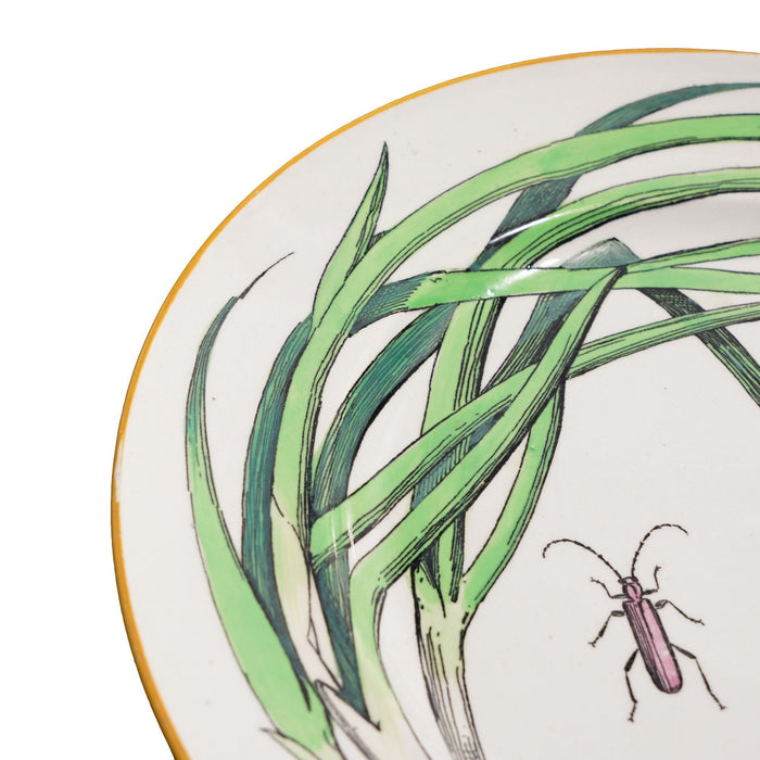 Pair of French glazed faience plates with scallions and artichokes (c. 1850's)