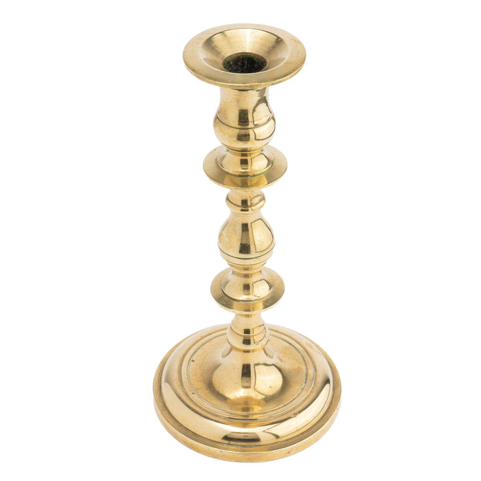 Continental core cast brass candlestick (1700's)