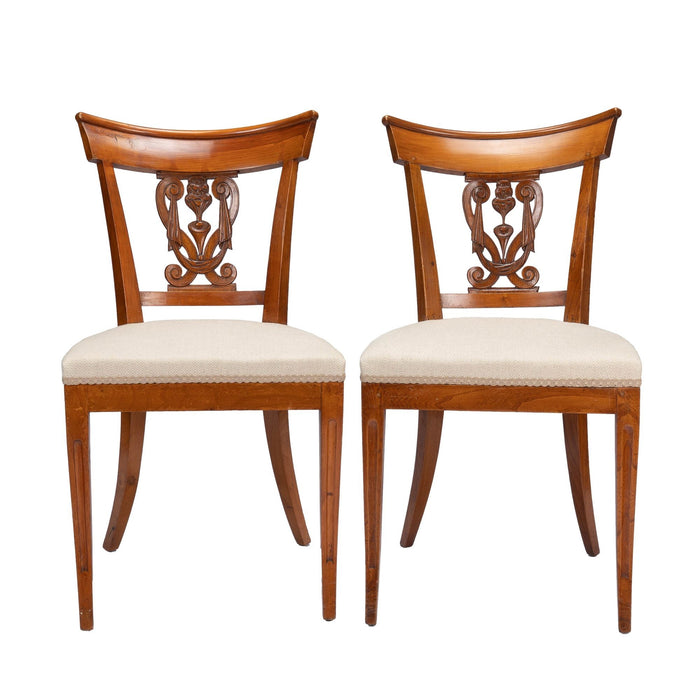 Pair of French Neoclassic upholstered seat side chairs (1795-1810)
