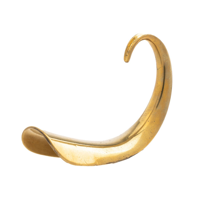 English cast brass pig tail shoe horn (1775-1800)