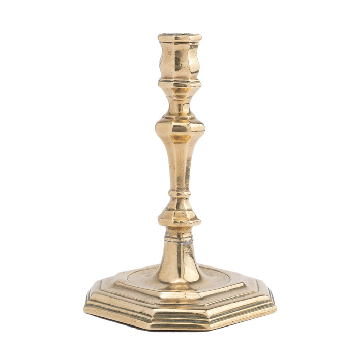 English Queen Anne octagonal base brass candlestick (1710-20)