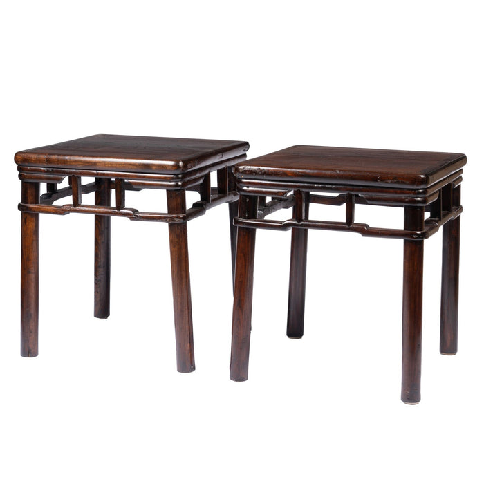 Pair of Chinese Elm stools with hump back rail (1780-1820)