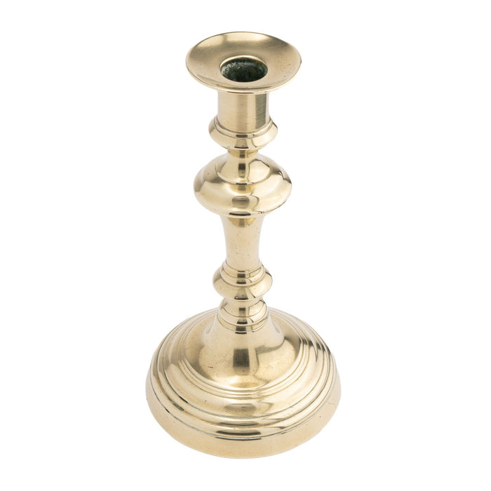 English Queen Anne brass candlestick with knob stem (1770)