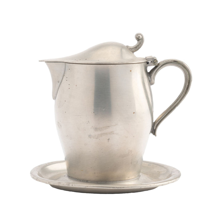 International Pewter creamer with hinged lid and attached tray (1920-30)