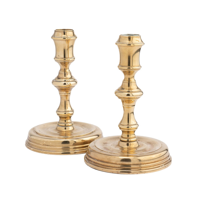 Pair of Essex Brass Academic Revival brass candlesticks (1900-25)