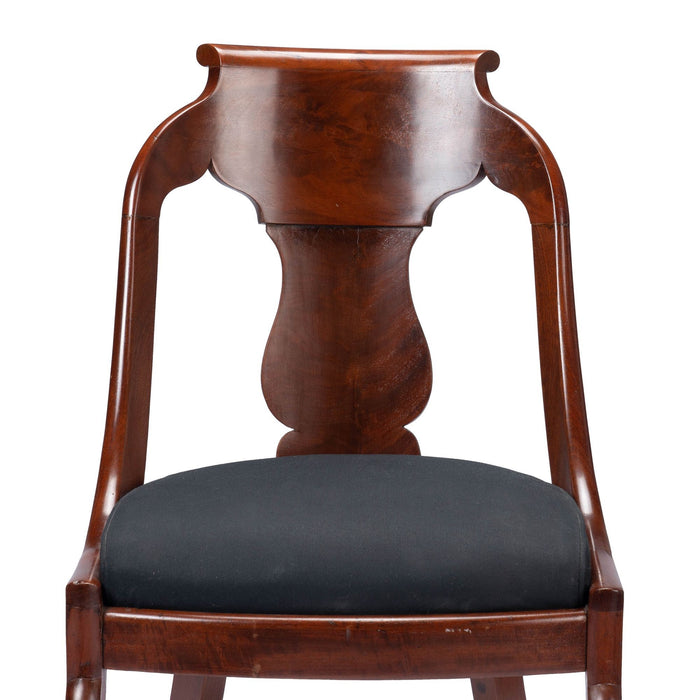 Pair of American mahogany upholstered slip seat gondola chairs (1830-35)