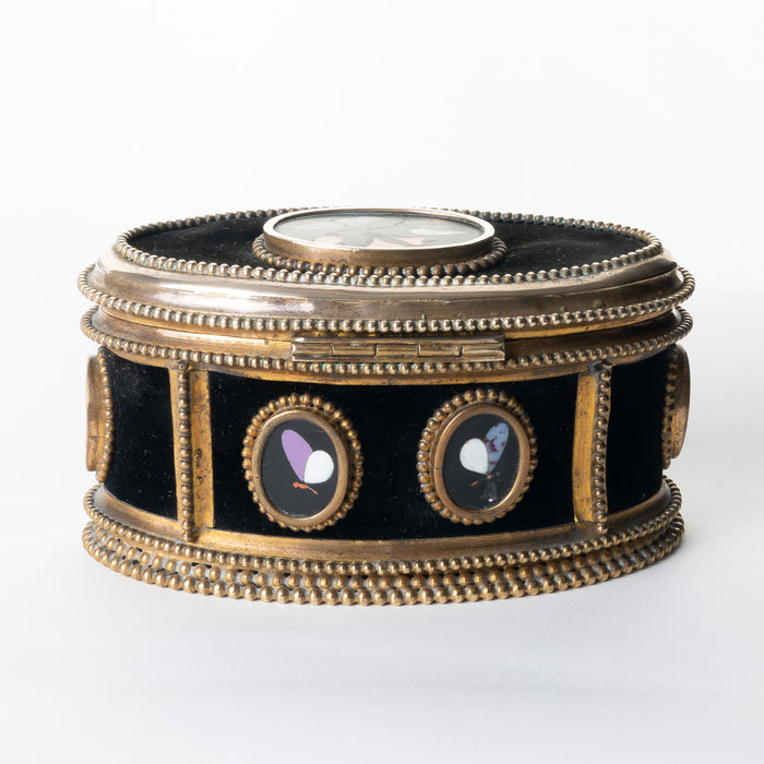 Italian oval jewelry cask in cast bronze and pietra dura with hinged lid (1850's)