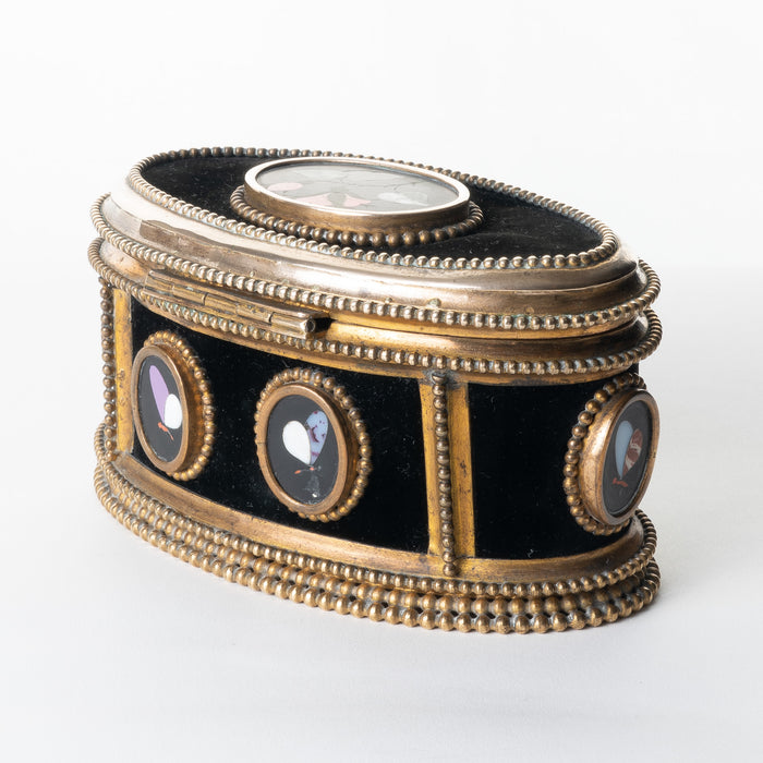 Italian oval jewelry cask in cast bronze and pietra dura with hinged lid (1850's)