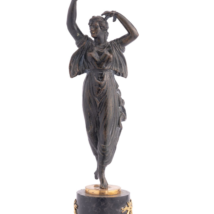 French Empire parcel gilt bronze figural candlestick (c. 1800-10)