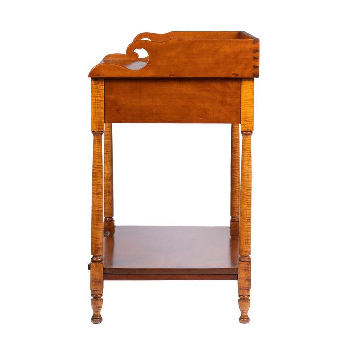 Philadelphia cherry wood dressing stand with splash on a conforming apron (1810-20)