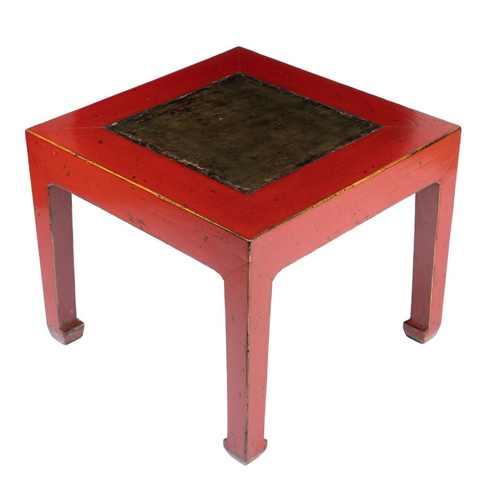 Chinese red lacquered square table fitted with inset stone top