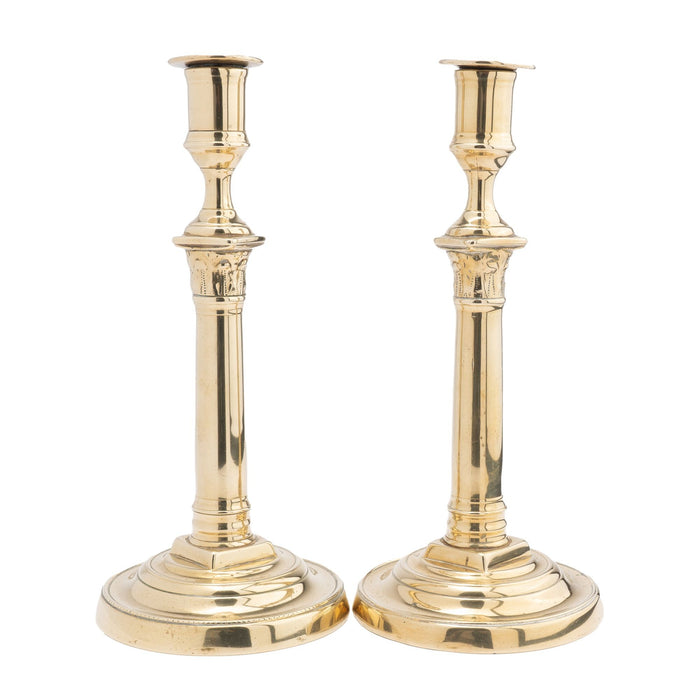Pair of French cast brass columnar candlesticks with Corinthian capitals (1820)