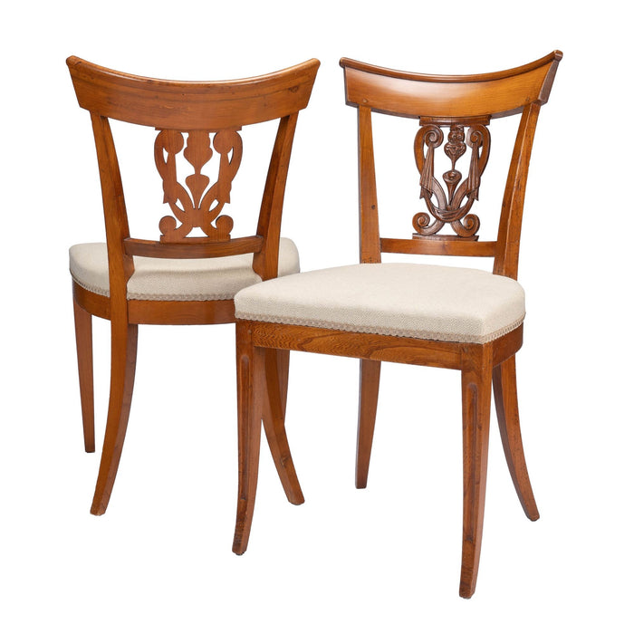 Pair of French Neoclassic upholstered seat side chairs (1795-1810)