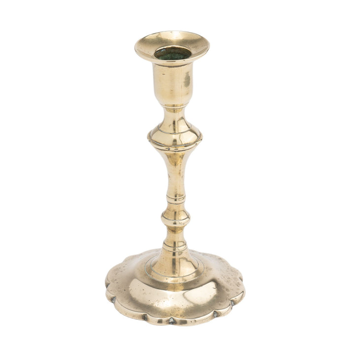 Cast brass Queen Anne petal base candlestick (c. 1760)