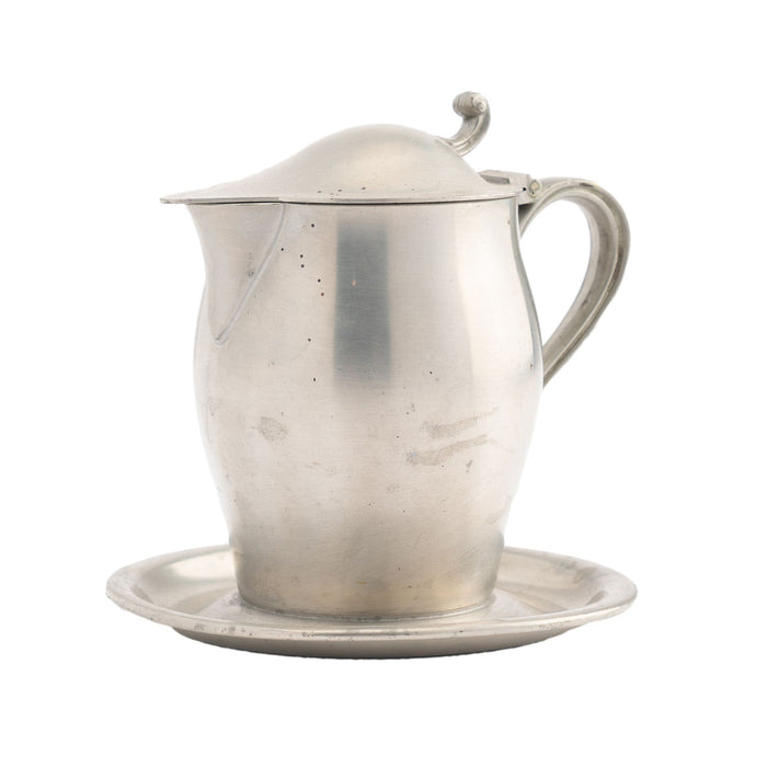 International Pewter creamer with hinged lid and attached tray (1920-30)