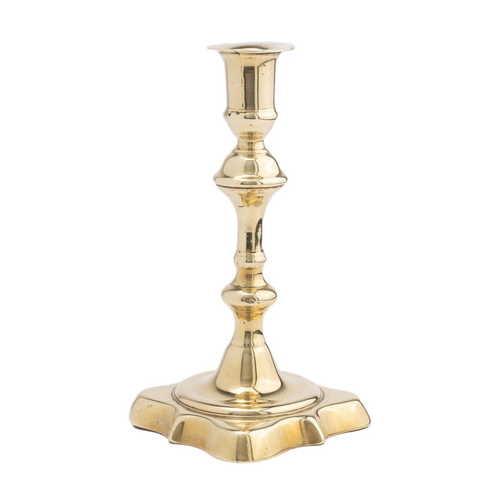 English brass Queen Anne candlestick (c. 1725)