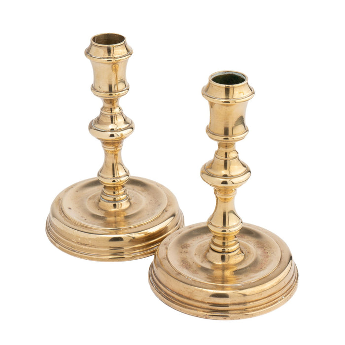 Pair of Essex Brass Academic Revival brass candlesticks (1900-25)
