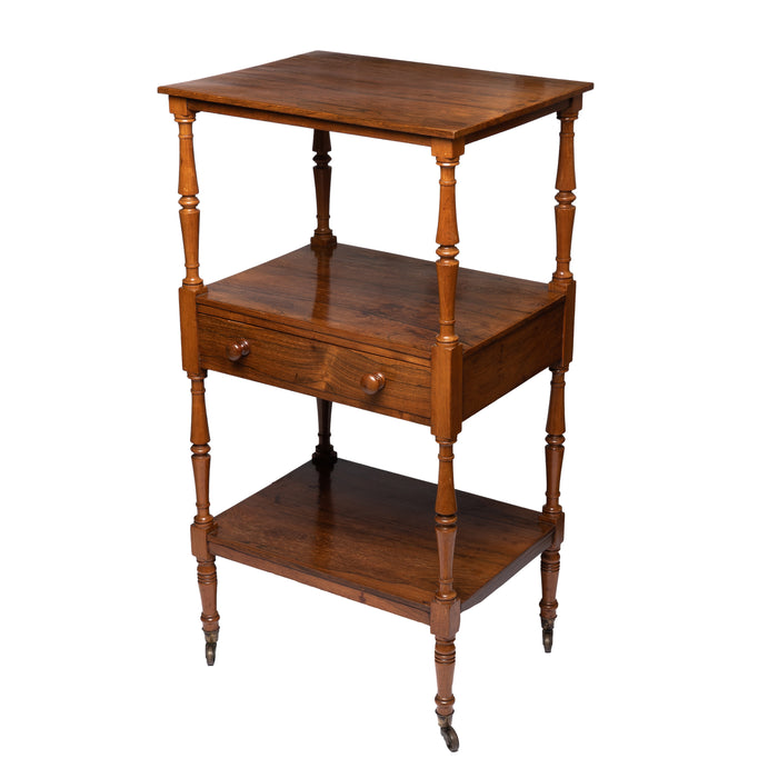 English three tier dumb waiter on brass castors in Brazilian rosewood (1810)